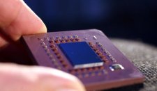 UNITED KINGDOM - MAY 21:  The IBM 'Power6' chip displayed at a product launch in central London, U.K., Monday, May 21, 2007. IBM introduced servers with its Power6 processor, a chip that lets users boost computer performance or reduce energy use, stepping up competition with Hewlett-Packard Co. and Sun Microsystems Inc.  (Photo by Graham Barclay/Bloomberg via Getty Images)